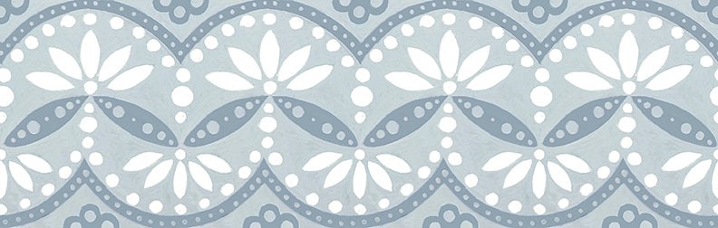 Dewdrop ceramic tile on 3x10 glossy subway tile. Featuring blue floral pattern